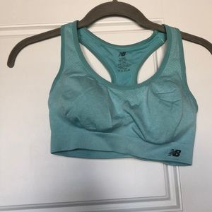 New Balance light teal sports bra.